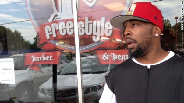 Mike Knox has been staying at his barbershop until 4 a.m during the Ferguson protests to ward off looters