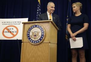 New York Sen. Chuck Schumer and his distant cousin, Amy Schumer, speak during a news conference in New York, Monday, Aug. 3, 2015. The Schumers are teaming up to try and enact gun control regulations. They cited the recent shooting in a Louisiana movie theater that killed two women and injured nine others during a screening of the movie "Trainwreck" starring Amy Schumer. (AP Photo/Seth Wenig)